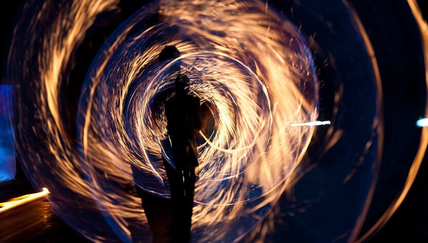 silhouette of person holding sparkler digital wallpaepr