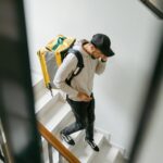 man going down the stairs