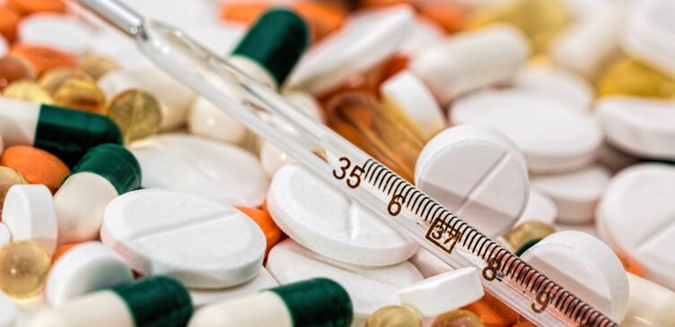 thermometer on medical pills